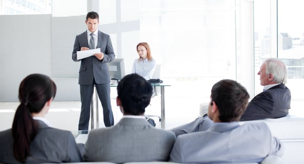 A team leader talking to his colleagues in an office-1