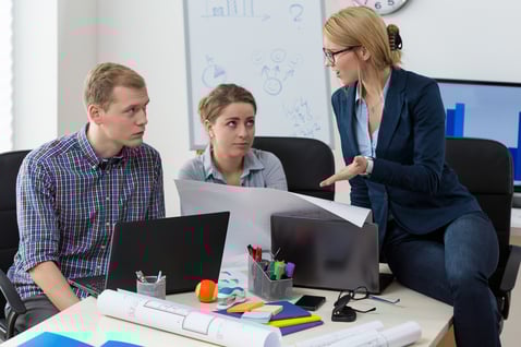 Female team leader being angry on her co-workers
