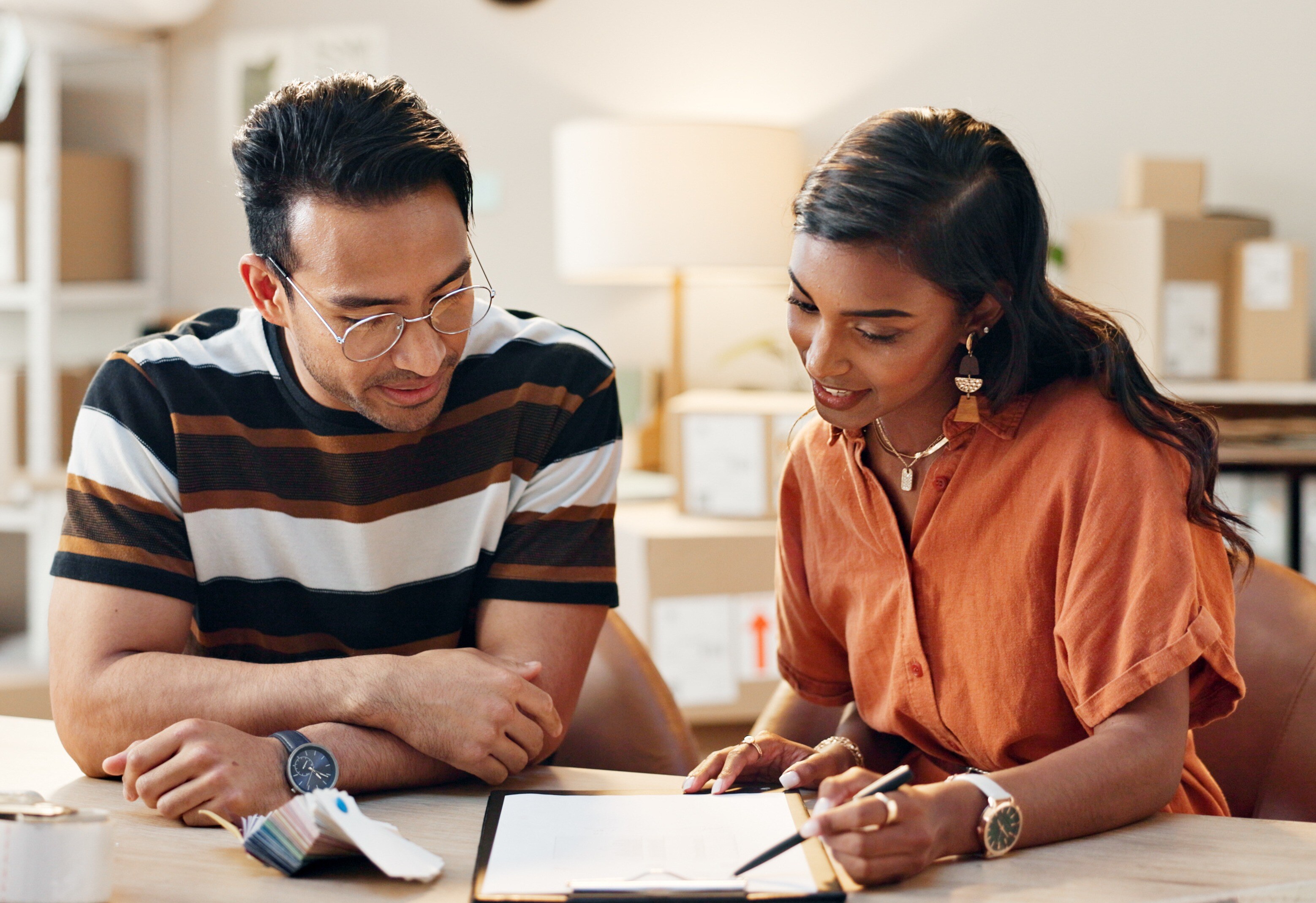Two employees going through leadership development checklist