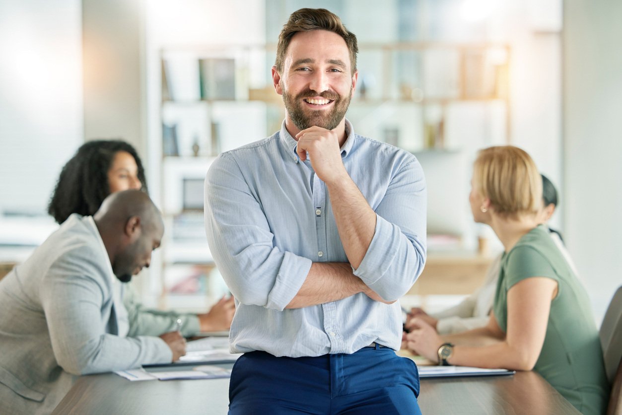 EOS Integrator smiling in front of business meeting